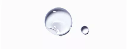 Two clear water droplets on a white background, one larger and one smaller, showcasing their round shapes and reflections.