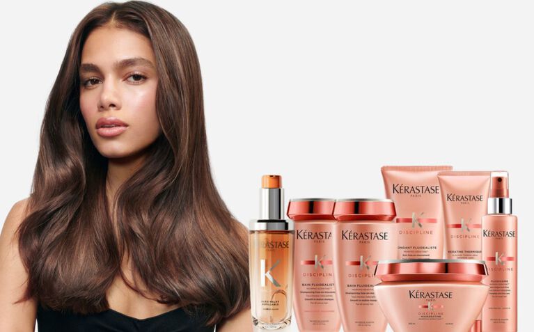 Kerastase Discipline model with hair care for frizzy hair.