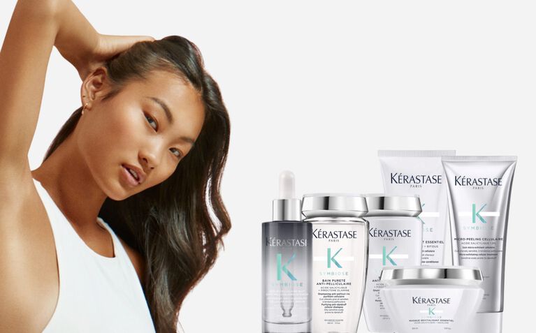 Kerastase Symbiose model with cellular anti-dandruff products