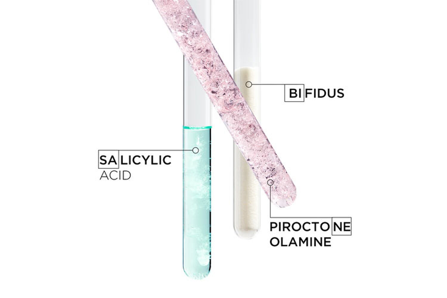 Alt text: Three test tubes containing different substances: one with salicylic acid (light blue liquid), one labeled bifidus (white solid), and one with piroctone olamine (pink crystalline substance).