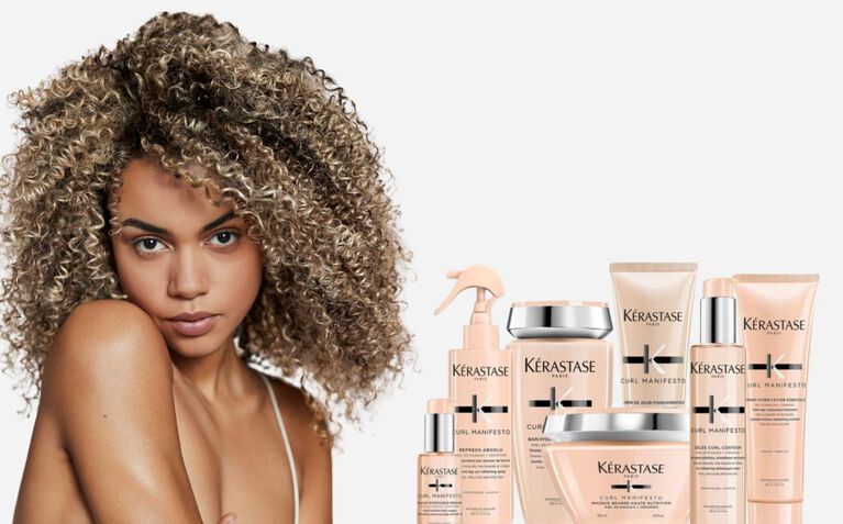 Kerastase Curl Manifesto model with products for curly and coily hair.