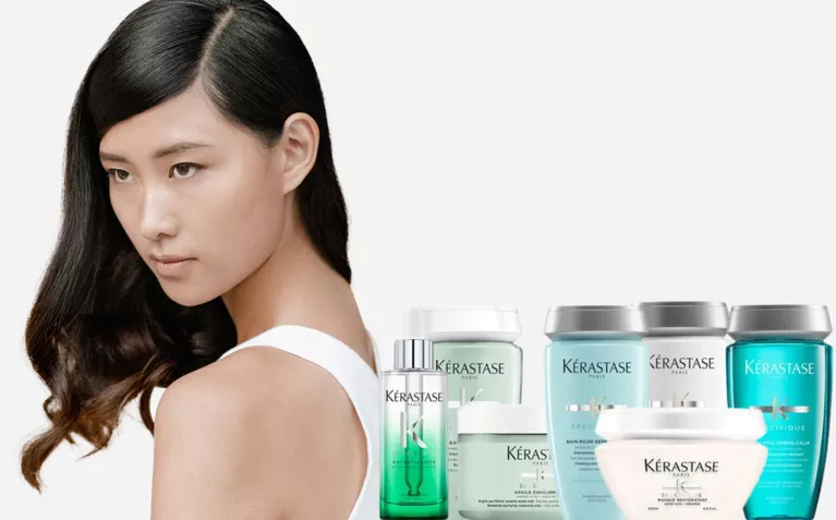 Kerastase Specifique model with hair care products for unbalanced scalps.