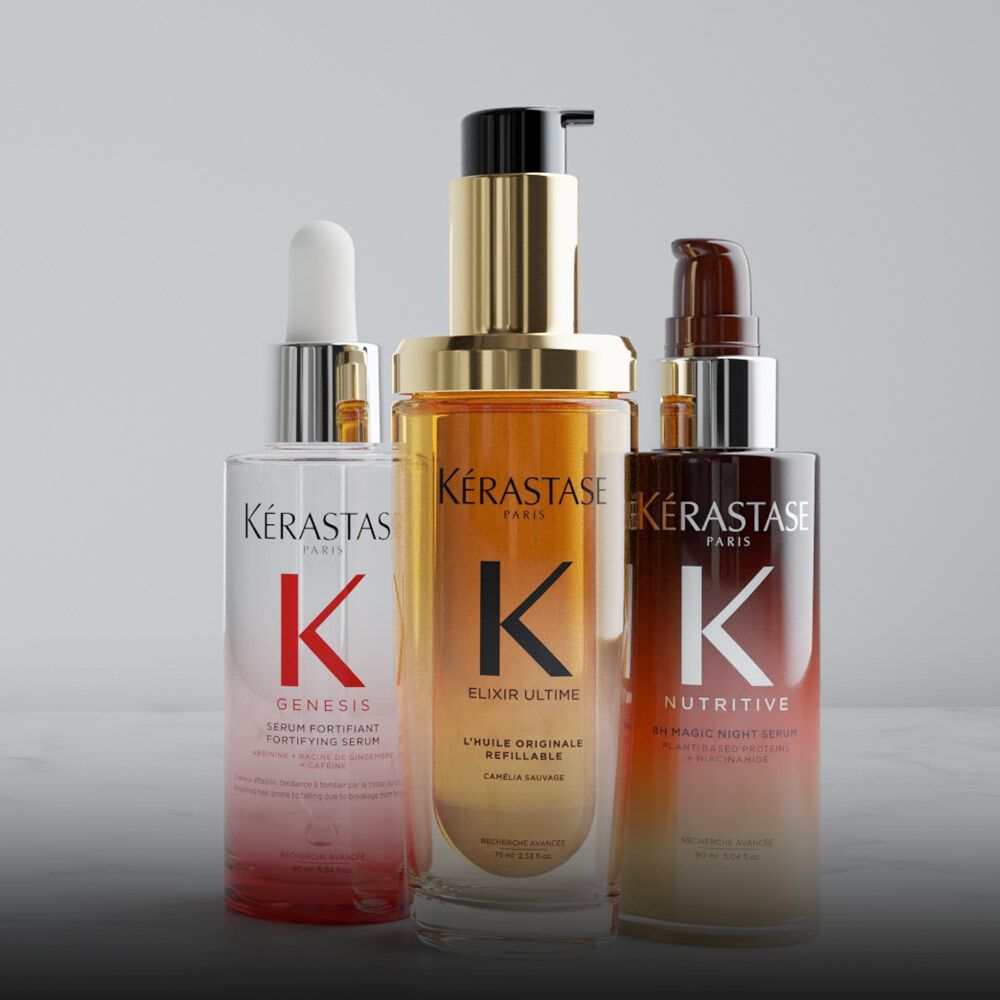 Three bottles next to each other, one white with red accents, one gold and one with brown and yellow shading.