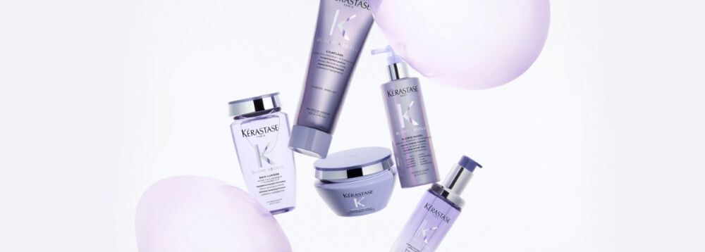 Kerastase BLOND ABSOLU range on a purple background