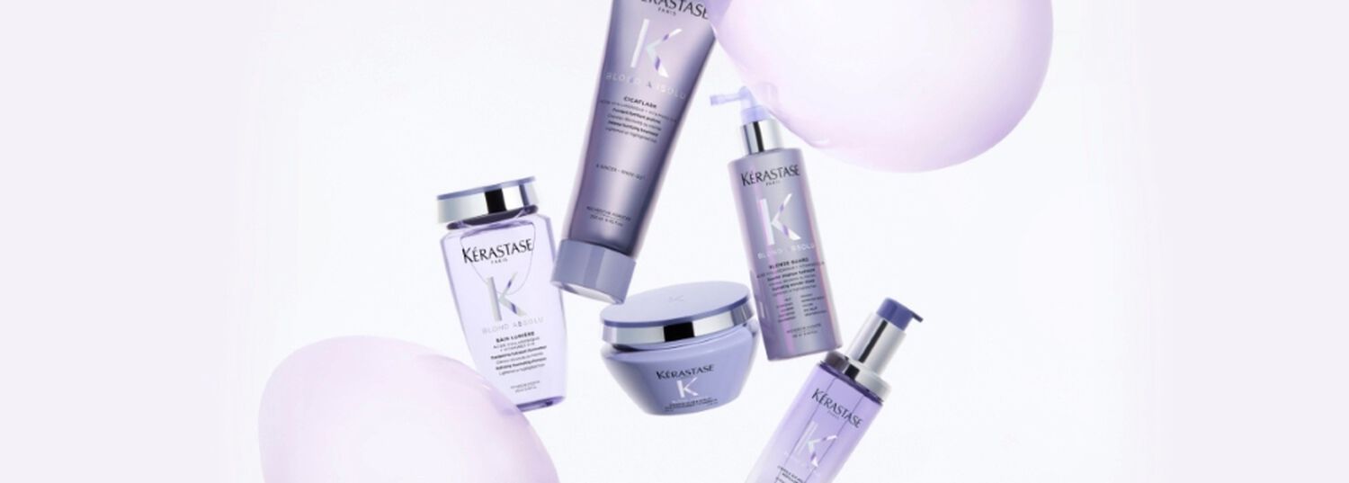 Kerastase BLOND ABSOLU range on a purple background
