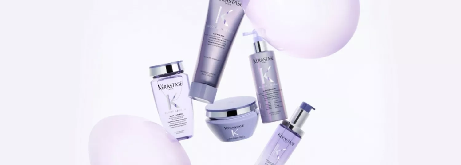 Kerastase BLOND ABSOLU range on a purple background