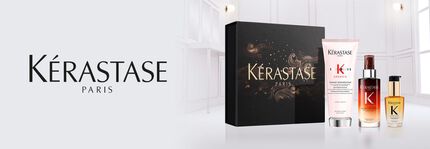 A promotional image featuring Kerastase Paris products, including two bottles of hair care serum against a dark, swirling background, with the brand logo prominently displayed.