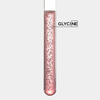 A test tube containing a pink solution with bubbles, labelled \'GLYCINE\'.