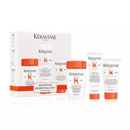 A Kerastase Nutritive essentials set for dry hair, featuring four product tubes in a stylish box.