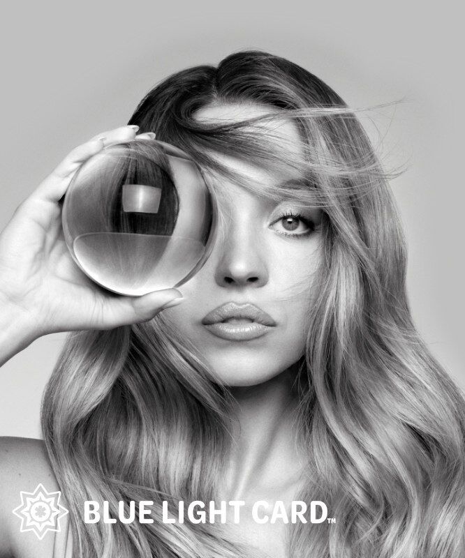 A black and white portrait of a woman