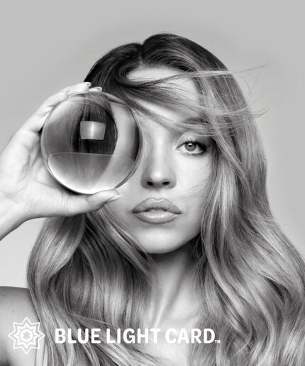 A black and white portrait of a woman