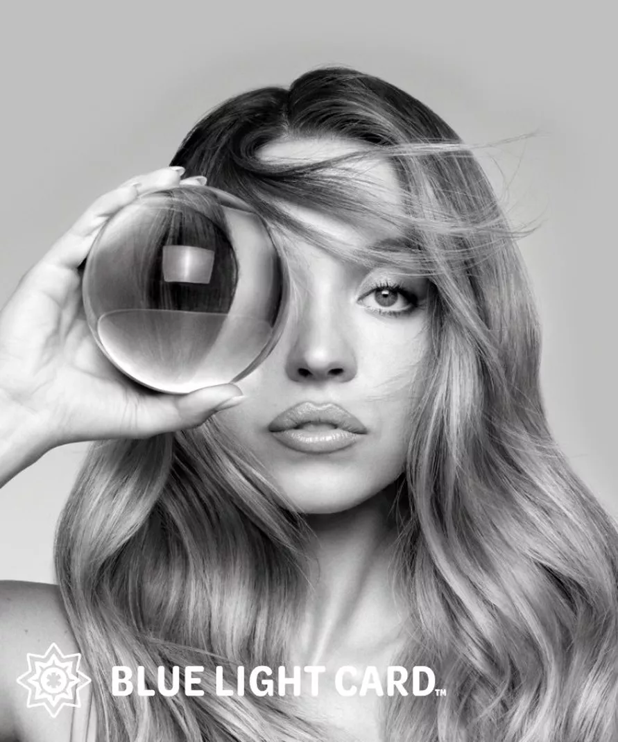 A black and white portrait of a woman