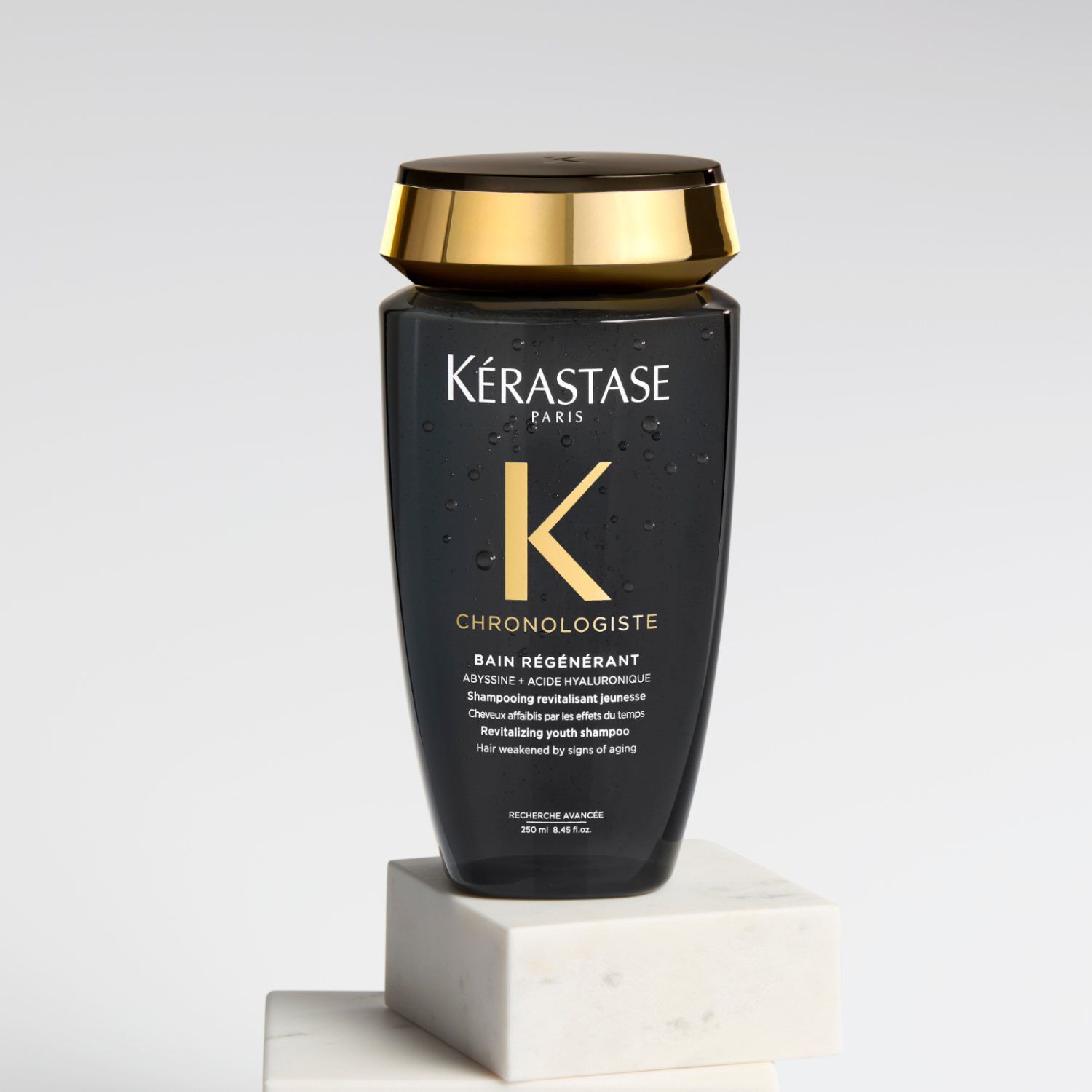 BAIN REGENERANT SHAMPOO on a light grey background