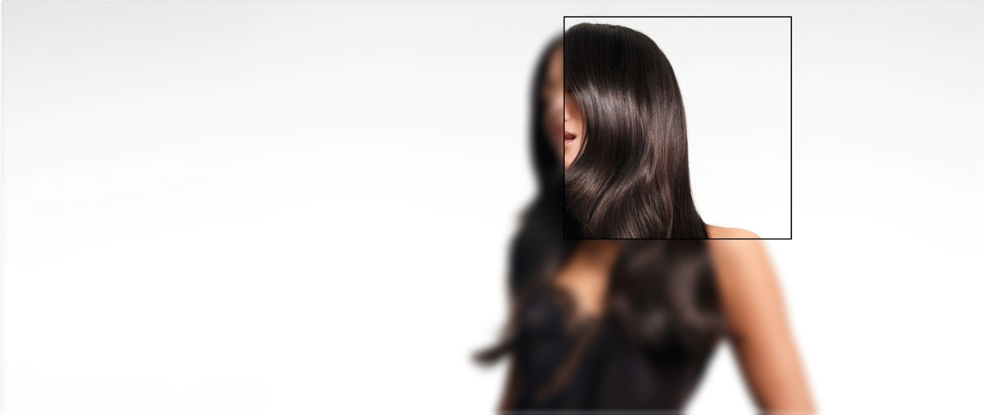 A close-up of a woman in a tank top, with a soft background, featuring digital mapping over her face and hair.