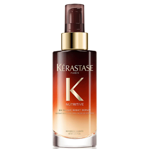 A bottle of Kérastase 8h Magic Night Serum, featuring a gradient design from dark to light brown.