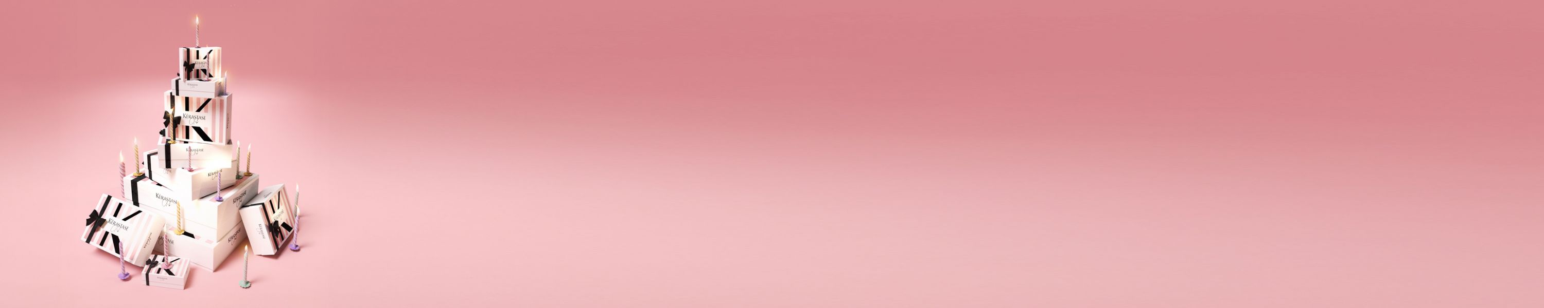 A Kérastase gift box featuring haircare products, promoting the concept of gifting for self-care or loved ones.