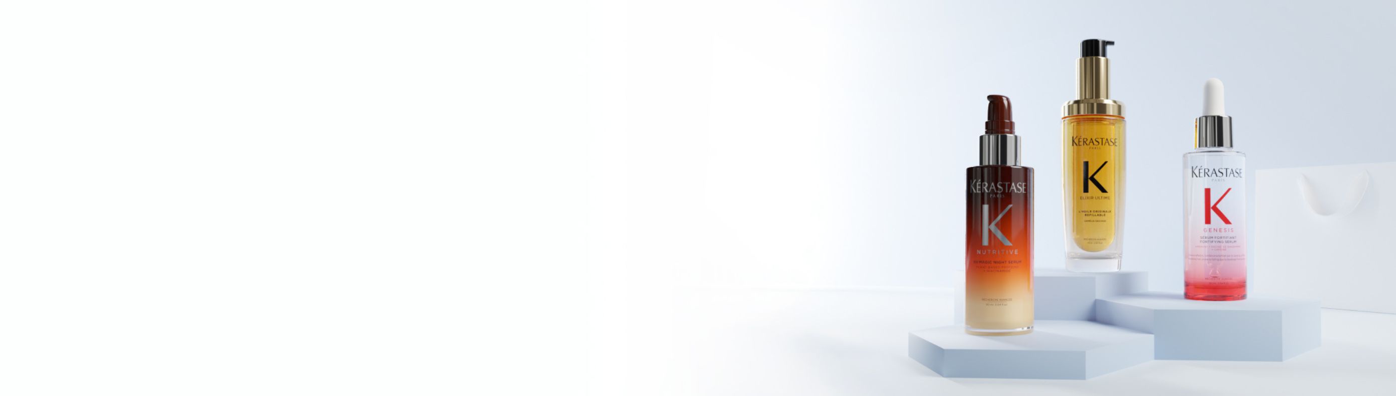 three of the most iconic products from Kérastase on a white background