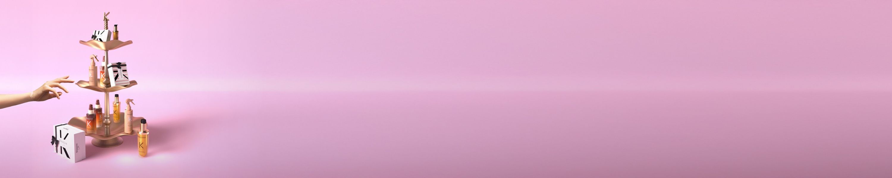A Kérastase gift box featuring haircare products, promoting the concept of gifting for self-care or loved ones.